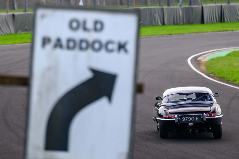 Hilton & Moss take the purple E-Type to Castle Combe