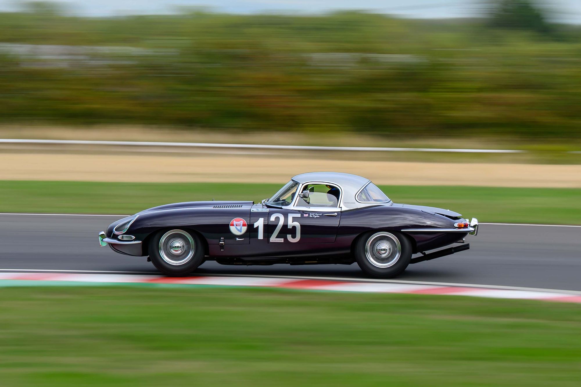 Hilton & Moss take the purple E-Type to Castle Combe